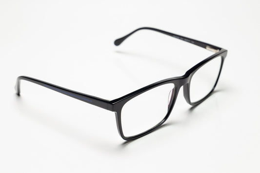 Close-up of stylish black eyeglasses perfect for fashion and eyewear content.